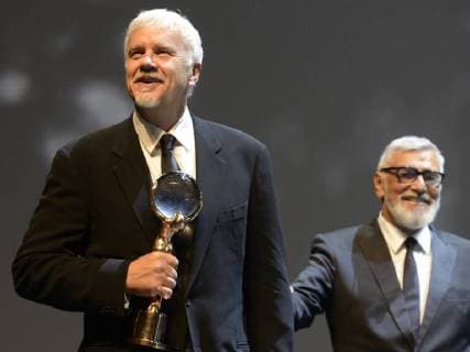 American actor and director Tim Robbins, left, receives a Crystal Globe Award for Outstanding Artistic Contribution to World Cinema from Festival President Jiri Bartoska during the 53d International Film Festival in Karlovy Vary (KVIFF), Czech Republic, on June 29, 2018. (CTKxPhoto KaterinaxSulova) CTKPhotoP201806290978701  _SUK9731