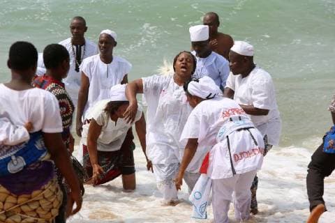 Woman in trance, Voodoo cult on a beach in Cotonou, Benin, West Africa, Africa Copyright: Godong 809-7393 Editorial Use Only