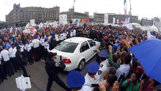 The future President of Mexico Andres Manuel Lopez Obrador is escorted by police on his way out of the National Palace, after meeting with the current President Enrique Pena Nieto, in Mexico City, Mexico, 03 July 2018. Obrador confirmed today that he will renounce official security, the residence of Los Pinos and the presidential plane, keeping his campaign promises. Lopez Obrador renounces security, official residence and plane !ACHTUNG: NUR REDAKTIONELLE NUTZUNG!  Copyright: xJorgexNúnezx MEX30 20180703-636662526909119437