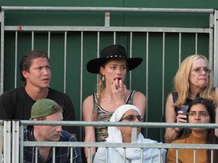 LONDON, ENGLAND - JULY 06: Amber Heard and new her beau 31 year old Vito Schnabel (Heidi Klum s ex Boyfriend)snuggle and stare at each other as they attend day five of the Wimbledon Tennis Championships at the All England Lawn Tennis and Croquet Club on July 6, 2018 in London, England..People: Amber Heard, Vito Schnabel London England - ZUMAs214 20180706_zba_s214_110 Copyright: xSMGx