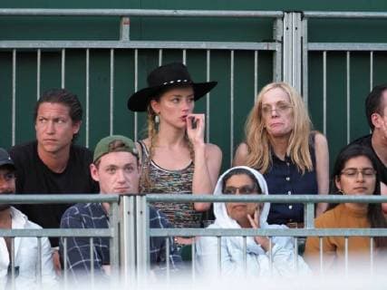 LONDON, ENGLAND - JULY 06: Amber Heard and new her beau 31 year old Vito Schnabel (Heidi Klum s ex Boyfriend)snuggle and stare at each other as they attend day five of the Wimbledon Tennis Championships at the All England Lawn Tennis and Croquet Club on July 6, 2018 in London, England..People: Amber Heard, Vito Schnabel London England - ZUMAs214 20180706_zba_s214_112 Copyright: xSMGx