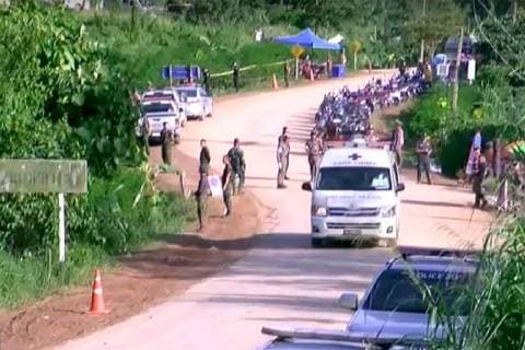 Paramedics transport some of the eight schoolboys, members of a local soccer team, who along with their coach, have been trapped inside Tham Luang Cave network in Northern Thailand on July 9, 2018. Two British volunteer divers found the missing boys Monday after a nine-day search. Screengrab via Thai PBS  WAX2018070901 THAIxPBS