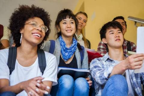 Group of college students studying on stairs  Copyright: DinocoxGreco B41762839