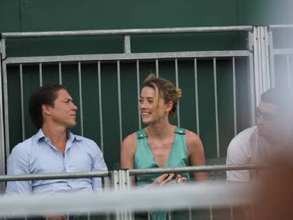 LONDON, ENGLAND - JULY 07: it s official THEY HAVE THEIR FIRST KISS Amber Heard wearing a low cut mint jumpsuit with new boyfriend Vito Schnabel attend day seven of the Wimbledon Tennis Championships at the All England Lawn Tennis and Croquet Club on July 7, 2018 in London, England..People: Vito Schnabel and Amber Heard London England - ZUMAs214 20180709_zba_s214_017 Copyright: xSMGx