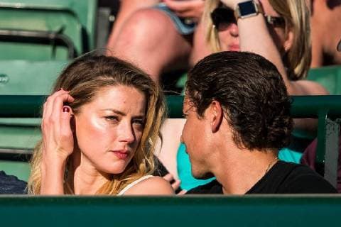 LONDON, ENG - JULY 11: american actress AMBER HEARD and american art curator VITO SCHNABEL during day nine match of the 2018 Wimbledon on July 11, 2018, at All England Lawn Tennis and Croquet Club in London,England. (Photo by Chaz Niell Icon Sportswire) 305687