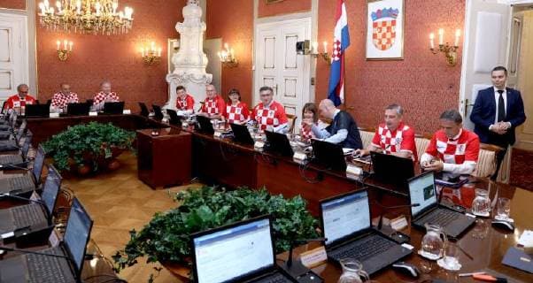 Croatian government in jerseys 12.07.2018. Zagreb, Croatia - Prime minister Andrej Plenkovic and other ministers during session of the government of the republic of Croatia dressed in Croatian national football team jersey after winning the match against England in semi-finals in Russia.  PatrikxMacek PIXSELL