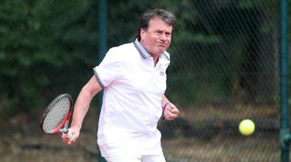 Tennis duel politics against economics Wolfgang Juettner Braunschweig