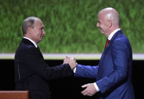 MOSCOW, RUSSIA - JULY 14, 2018: Russia s President Vladimir Putin (L) and FIFA President Gianni Infantino attend a gala concert of world opera stars held at Moscow s Bolshoi Theatre ahead of the 2018 FIFA World Cup Final match. Mikhail Metzel TASS  TS0896CA