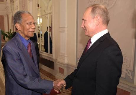 MOSCOW, RUSSIA - JULY 14, 2018: Former President of Madagaskar Didier Ratsiraka (L) and Russia s President Vladimir Putin shake hands after a gala concert of world opera stars held at Moscow s Bolshoi Theatre ahead of the 2018 FIFA World Cup Final match. Alexei Druzhinin Russian Presidential Press and Information Office TASS  TS0896D8
