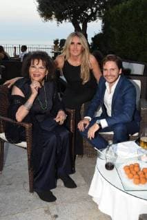 Taormina: Cinematographic Nations Award Evening. Photo: Tiziana Rocca between Claudia Cardinale and Daniel Bruhl  Copyright: xMaurizioxD Avanzox xIPAx xMaurizioxDxAvanzox