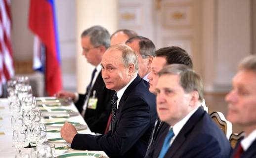 July 16, 2018 - Moscow, Russia - Russian President Vladimir Putin sits across from U.S. President Donald Trump during the full delegation meeting at the U.S. - Russia Summit Meeting at the Presidential Palace July 16, 2018 in Helsinki, Finland. Moscow Russia - ZUMAp138 20180716_zaa_p138_008 Copyright: xKremlinxPoolx