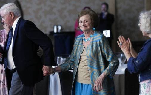 July 20, 2018 - San Diego, CA, USA - SAN DIEGO, July 20, 2018 Joye Murchison Kelly, 94, ghost writer of Wonder Woman , is lead by her husband Jack Kelly as she heads to the stage to receive her Bill Finger Award for Excellence in Comic Book Writing during the Will Eisner Comic Industry Awards ceremony at the Hilton Bayfront in San Diego on Friday. Hayne Palmour IV San Diego Union-Tribune Mandatory Credit: HAYNE PALMOUR IV SAN DIEGO UNION-TRIBUNE ZUMA PRESS San Diego Union-Tribune Hayne Palmour IV copyright 2018 San Diego USA - ZUMAs44_ 20180720_zaf_s44_062 Copyright: xHaynexPalmourxIvx