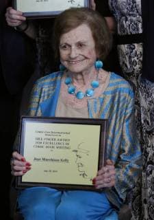 July 20, 2018 - San Diego, CA, USA - SAN DIEGO, July 20, 2018 Joye Murchison Kelly, 94, ghost writer of Wonder Woman , holds her Bill Finger Award for Excellence in Comic Book Writing as she poses for photos during the Will Eisner Comic Industry Awards ceremony at the Hilton Bayfront in San Diego on Friday. Hayne Palmour IV San Diego Union-Tribune Mandatory Credit: HAYNE PALMOUR IV SAN DIEGO UNION-TRIBUNE ZUMA PRESS San Diego Union-Tribune Hayne Palmour IV copyright 2018 San Diego USA - ZUMAs44_ 20180720_zaf_s44_074 Copyright: xHaynexPalmourxIvx