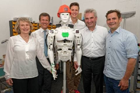 Press Breakfast for the Founder Award 2017 at Startup IOX LAB Here a group picture with a humanoid robot developed by the startup From left to right Prof Dr Christine Volkmann UNESCO C