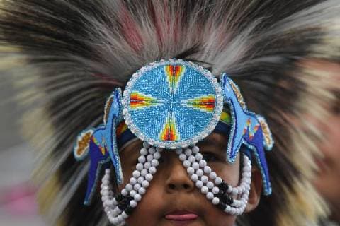 July 25, 2018 - Edmonton, Canada - A portrait of a young member of the First Nations during the third annual traditional Pow Wow competition, at the K-Days Festival in Edmonton. .Over 700 First Nations dancers from dozens of different tribes will be featured at K-Days in Edmonton over three days this week..On Tuesday, July 24, 2018, in Edmonton, Alberta, Canada. Edmonton Canada  - ZUMAn230 20180725_zaa_n230_022 Copyright: xArturxWidakx