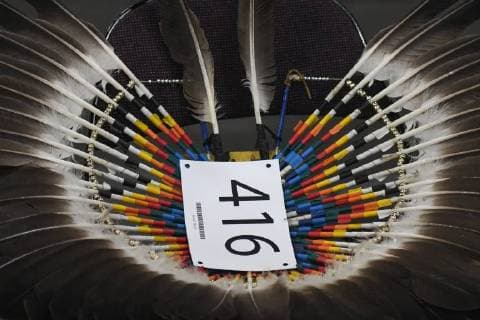 July 25, 2018 - Edmonton, Canada - A feathered headdress seen during the third annual traditional Pow Wow competition, at the K-Days Festival in Edmonton. Over 700 First Nations dancers from dozens of different tribes will be featured at K-Days in Edmonton over three days this week..On Tuesday, July 24, 2018, in Edmonton, Alberta, Canada. Edmonton Canada  - ZUMAn230 20180725_zaa_n230_034 Copyright: xArturxWidakx