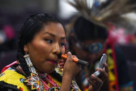July 25, 2018 - Edmonton, Canada - A young member of the First Nations getting ready to perform a traditional dance during the third annual traditional Pow Wow competition, at the K-Days Festival in Edmonton. .Over 700 First Nations dancers from dozens of different tribes will be featured at K-Days in Edmonton over three days this week..On Tuesday, July 24, 2018, in Edmonton, Alberta, Canada. Edmonton Canada  - ZUMAn230 20180725_zaa_n230_041 Copyright: xArturxWidakx