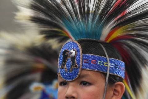 July 25, 2018 - Edmonton, Canada - A portrait of a young member of the First Nations during the third annual traditional Pow Wow competition, at the K-Days Festival in Edmonton. .Over 700 First Nations dancers from dozens of different tribes will be featured at K-Days in Edmonton over three days this week..On Tuesday, July 24, 2018, in Edmonton, Alberta, Canada. Edmonton Canada  - ZUMAn230 20180725_zaa_n230_055 Copyright: xArturxWidakx