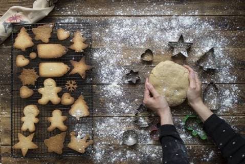 Woman s hands kneading dough for gingerbread cookies model released Symbolfoto  SKCF00469