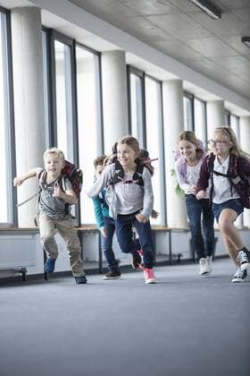 Excited pupils rushing down school corridor model released Symbolfoto property released  WESTF24188