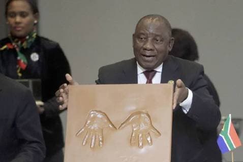 JOHANNESBURG, SOUTH AFRICA - JULY 26, 2018: South Africa s President Cyril Ramaphosa after leaving impressions of his hands on a decorative board at the 10th BRICS Leaders Summit. Mikhail Metzel TASS  TS08AC51