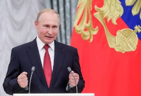 MOSCOW, RUSSIA - JULY 28, 2018: The President of Russia Vladimir Putin speaks at a ceremony to award national decorations to Russia s national men s football team and coaches at the Kremlin; the Russian national team reached the quarterfinals at the 2018 FIFA World Cup. Mikhail Metzel TASS  TS08B0DA