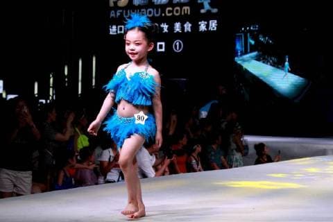 July 30, 2018 - Zhengzh, Zhengzh, China - Zhengzhou, CHINA-The kid model contest is held in Zhengzhou, central China s Henan Province. Zhengzh China  - ZUMAs145 20180730_zaa_s145_127 Copyright: xYuanxXiaoqiangx