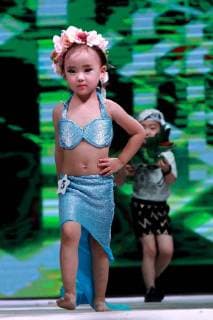 July 30, 2018 - Zhengzh, Zhengzh, China - Zhengzhou, CHINA-The kid model contest is held in Zhengzhou, central China s Henan Province. Zhengzh China  - ZUMAs145 20180730_zaa_s145_138 Copyright: xYuanxXiaoqiangx