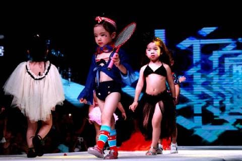 July 30, 2018 - Zhengzh, Zhengzh, China - Zhengzhou, CHINA-The kid model contest is held in Zhengzhou, central China s Henan Province. Zhengzh China  - ZUMAs145 20180730_zaa_s145_145 Copyright: xYuanxXiaoqiangx