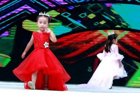 Kid model contest held in Central China The kid model contest is held in Zhengzhou, central China s Henan Province. CHINA OUT Zhengzhou Zhengzhou China  YuanxXiaoqiang