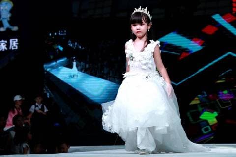 Kid model contest held in Central China The kid model contest is held in Zhengzhou, central China s Henan Province. CHINA OUT Zhengzhou Zhengzhou China  YuanxXiaoqiang