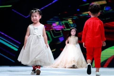 Kid model contest held in Central China The kid model contest is held in Zhengzhou, central China s Henan Province. CHINA OUT Zhengzhou Zhengzhou China  YuanxXiaoqiang