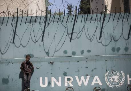 July 31, 2018 - Gaza City, The Gaza Strip, Palestine - Employees of the UN Relief and Works Agency for Palestine Refugees in the Near East(UNRWA)and their families protest against job cuts announced by the agency outside its offices in Gaza City on July 31, 2018. Gaza City Palestine - ZUMAq100 20180731_zaa_q100_009 Copyright: xMahmoudxIssax