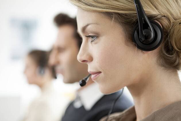 Office worker multitasking  Copyright: SigridxOlsson B62165523