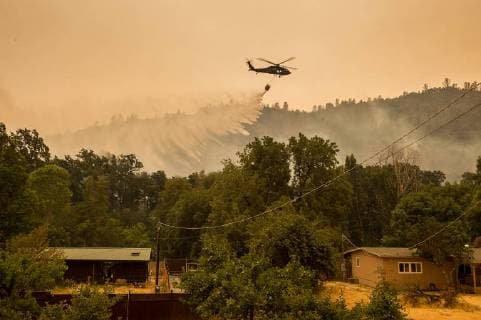 August 6, 2018 - Lake County, California, U.S. - Helicoptors attack a hot spot on New Long Valley Road during the Ranch Fire on Monday in Lake County. The Mendocino Complex Fire is the second-largest wildfire in the state’s history. Lake County U.S. - ZUMAs76_ 20180806_zaf_s76_005 Copyright: xPaulxKitagakixJrx
