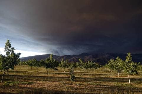 August 6, 2018 - Ukiah, California, USA - Ukiah, California, U.S. - Smoke rises above the hills north of Clear Lake. Ukiah USA - ZUMAw332 20180806_zap_w332_007 Copyright: xNealxWatersx