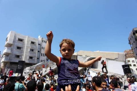 August 10, 2018 - Gaza City, Gaza Strip, Palestinian Territory - Members of a Palestinian musical band perform on the rubble of Said al-Mishal Cultural Center following an Israeli air strike destroyed it on the previous day, in Gaza city on Aug. 10, 2018 Gaza City Palestinian Territory - ZUMAap3_ 20180810_zaf_ap3_016 Copyright: xMahmoudxAjourx