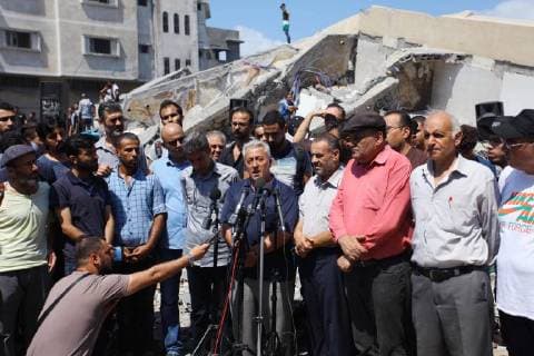 August 10, 2018 - Gaza City, Gaza Strip, Palestinian Territory - Palestinian Officials from Ministry of Culture held a press conference on the rubble of Said al-Mishal Cultural Center following an Israeli air strike destroyed it on the previous day, in Gaza city on Aug. 10, 2018 Gaza City Palestinian Territory - ZUMAap3_ 20180810_zaf_ap3_003 Copyright: xMahmoudxAjourx