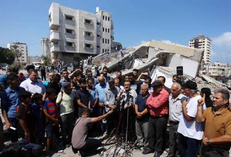 August 10, 2018 - Gaza City, Gaza Strip, Palestinian Territory - Palestinian Officials from Ministry of Culture held a press conference on the rubble of Said al-Mishal Cultural Center following an Israeli air strike destroyed it on the previous day, in Gaza city on Aug. 10, 2018 Gaza City Palestinian Territory - ZUMAap3_ 20180810_zaf_ap3_006 Copyright: xMahmoudxAjourx
