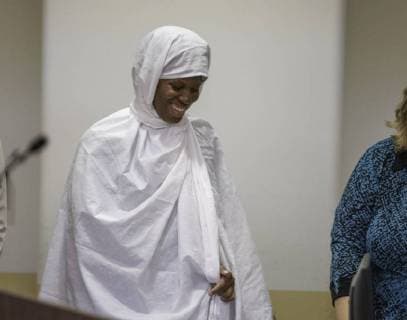 August 13, 2018 - Taos, NM, U.S. - Albuquerque Journal.hearing for the five adults charged with child abuse in the Amalia compound case were in court Monday afternoon to see judge Sarah C. Backus. Pictured is Subhannah Wahhaj(Cq) smiles after she learns she will be released from jail. .Taos, New Mexico Albuquerque Journal Taos U.S. - ZUMAab1_ 20180813_zaf_ab1_022 Copyright: xRobertoxE.xRosalesx
