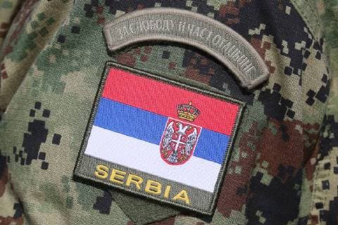 LENINGRAD REGION, RUSSIA - AUGUST 16, 2018: A Serbian serviceman s shoulder sleeve insignia seen during joint military exercises held by motor rifle units of Russia s Western Military District and the Serbian Army on the Luzhsky range. Alexander Demianchuk TASS  TS08CF2C