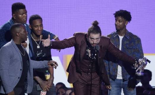 Post Malone accepts the Song of the Year award during the 35th annual MTV Video Music Awards at Radio City Music Hall in New York City on August 20, 2018.  NYP20180820120 JOHNxANGELILLO