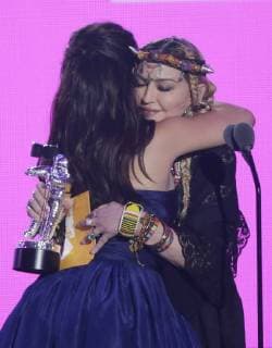 Madonna (R) hugs Video of the Year winner Camila Cabello during the 35th annual MTV Video Music Awards at Radio City Music Hall in New York City on August 20, 2018.  NYP20180820156 JOHNxANGELILLO