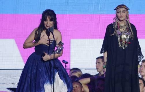 Madonna (R) watches Video of the Year winner Camila Cabello accept the award during the 35th annual MTV Video Music Awards at Radio City Music Hall in New York City on August 20, 2018.  NYP20180820167 JOHNxANGELILLO