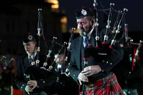 MOSCOW, RUSSIA â€“ AUGUST 24, 2018: Member of the Celtic Massed Pipes and Drums Band perform at the opening of the 2018 Spasskaya Tower International Military Music Festival, in Moscow s Red Square. Anton Novoderezhkin TASS  TS08DEC4