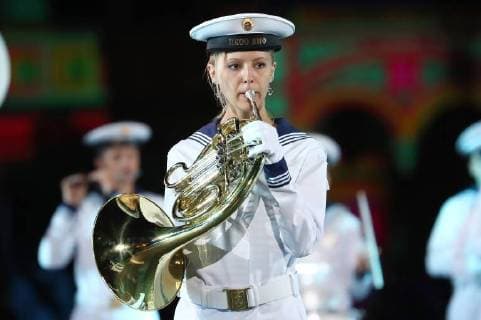 MOSCOW, RUSSIA â€“ AUGUST 24, 2018: Members of the Rimsky-Korsakov Central Concert Band of the Russian Navy perform at the opening of the 2018 Spasskaya Tower International Military Music Festival, in Moscow s Red Square. Anton Novoderezhkin TASS  TS08DED3