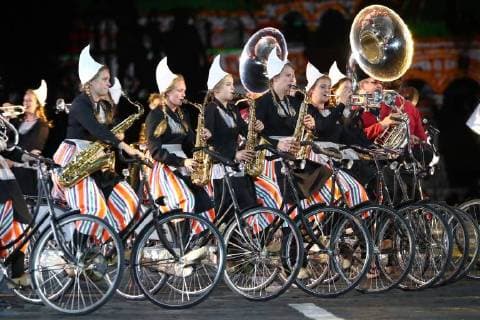 MOSCOW, RUSSIA â€“ AUGUST 24, 2018: Members of the Crescendo Bicycle Showband perform at the opening of the 2018 Spasskaya Tower International Military Music Festival, in Moscow s Red Square. Anton Novoderezhkin TASS  TS08DEF5