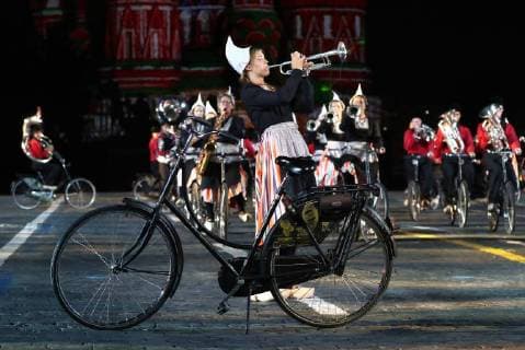 MOSCOW, RUSSIA â€“ AUGUST 24, 2018: Members of the Crescendo Bicycle Showband perform at the opening of the 2018 Spasskaya Tower International Military Music Festival, in Moscow s Red Square. Anton Novoderezhkin TASS  TS08DEF6