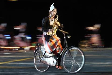 MOSCOW, RUSSIA â€“ AUGUST 24, 2018: Member of the Crescendo Bicycle Showband performs at the opening of the 2018 Spasskaya Tower International Military Music Festival, in Moscow s Red Square. Anton Novoderezhkin TASS  TS08DEF7