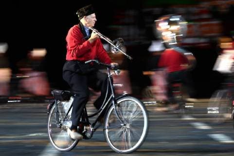 MOSCOW, RUSSIA â€“ AUGUST 24, 2018: Member of the Crescendo Bicycle Showband performs at the opening of the 2018 Spasskaya Tower International Military Music Festival, in Moscow s Red Square. Anton Novoderezhkin TASS  TS08DEF8